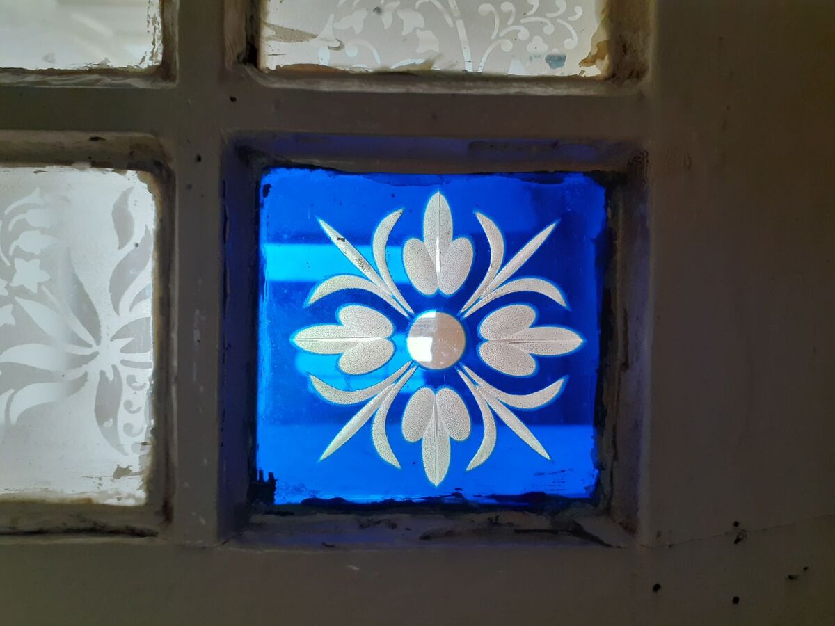 Ornate glass door from 1884